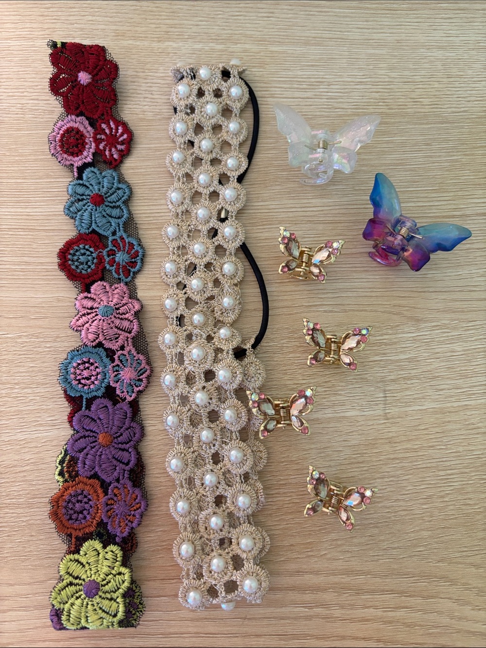 Bundle  of 8 floral butterfly hair accessories.